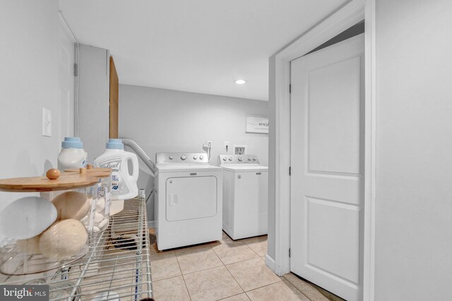 1823 Swansea Rd, Baltimore, MD 21239 - clothes washing area with separate washer and dryer, light tile patterned flooring, laundry area, and recessed lighting