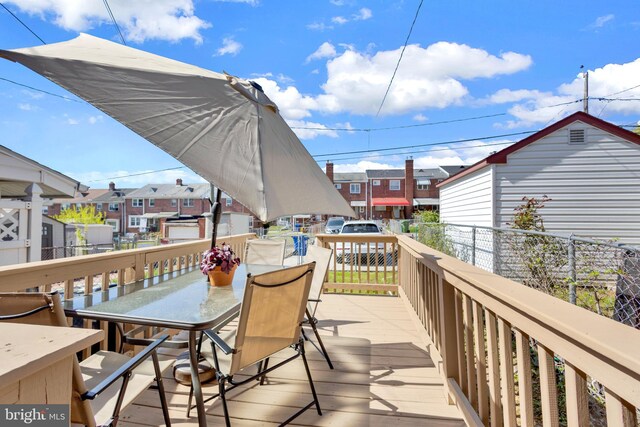 1823 Swansea Rd, Baltimore, MD 21239 - wooden terrace with a residential view and outdoor dining space