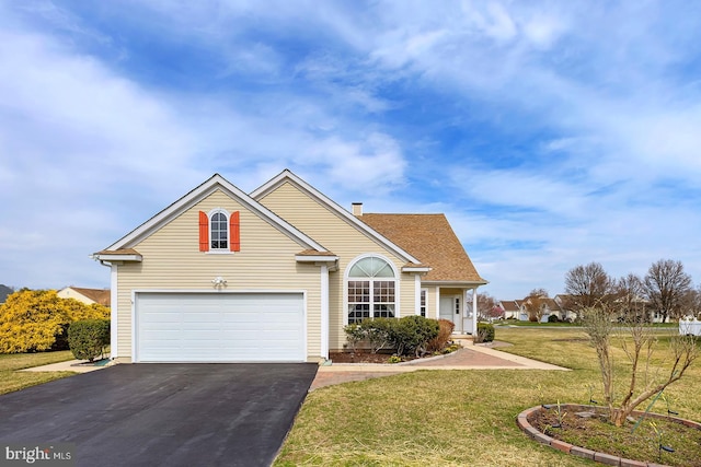 10 Cavendish Ct, Rehoboth Beach, DE 19971 - traditional home with driveway, a front lawn, an attached garage, and roof with shingles