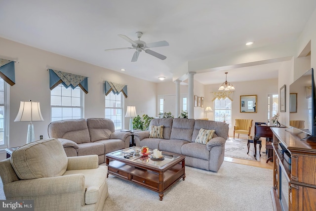 10 Cavendish Ct, Rehoboth Beach, DE 19971 - living area with plenty of natural light, a chandelier, decorative columns, a ceiling fan, and recessed lighting