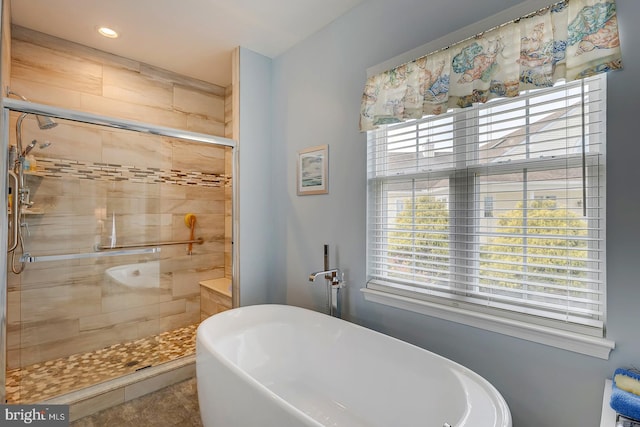 10 Cavendish Ct, Rehoboth Beach, DE 19971 - full bath featuring a freestanding tub, a stall shower, healthy amount of natural light, and recessed lighting