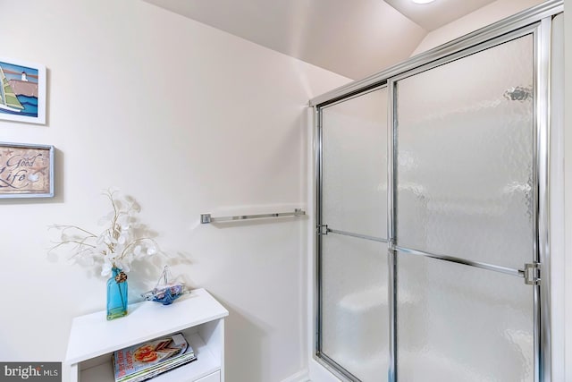 10 Cavendish Ct, Rehoboth Beach, DE 19971 - full bath featuring a shower with door and lofted ceiling