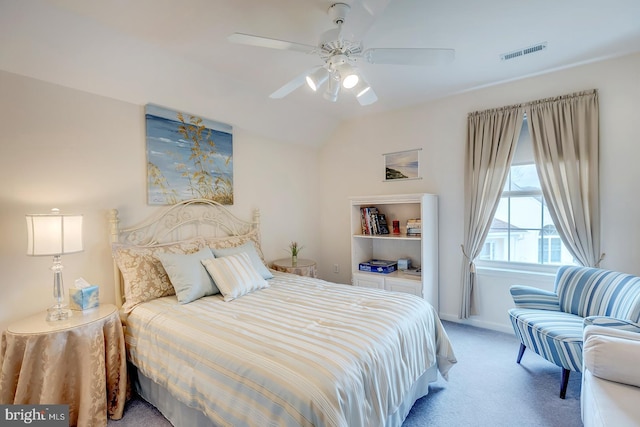 10 Cavendish Ct, Rehoboth Beach, DE 19971 - bedroom with light colored carpet, a ceiling fan, and vaulted ceiling