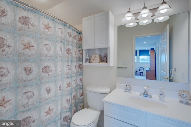 10 Cavendish Ct, Rehoboth Beach, DE 19971 - full bathroom with vanity, toilet, and a shower with curtain