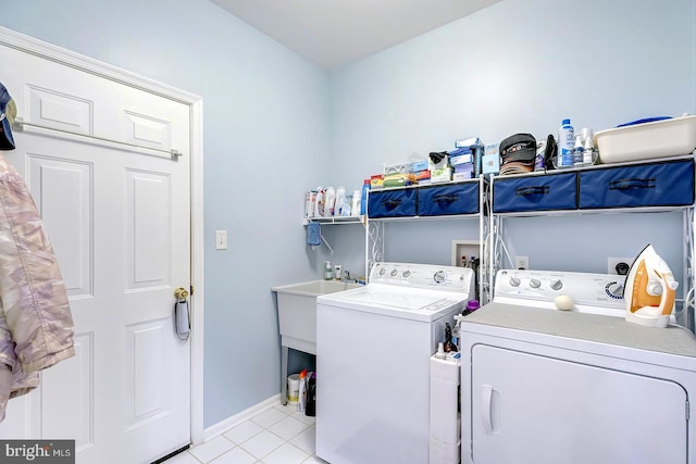 10 Cavendish Ct, Rehoboth Beach, DE 19971 - laundry room with washer and dryer, baseboards, and light tile patterned floors