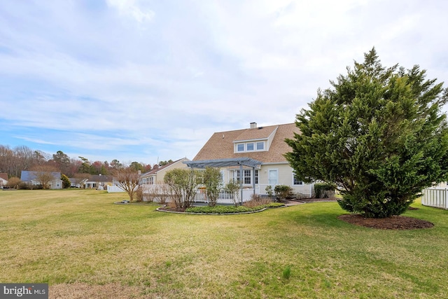 10 Cavendish Ct, Rehoboth Beach, DE 19971 - view of grassy yard featuring a pergola