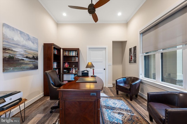 home office with ornamental molding, a ceiling fan, baseboards, and dark wood-style flooring