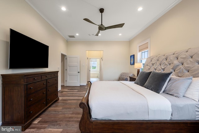 bedroom with multiple windows, visible vents, ornamental molding, and dark wood-style flooring