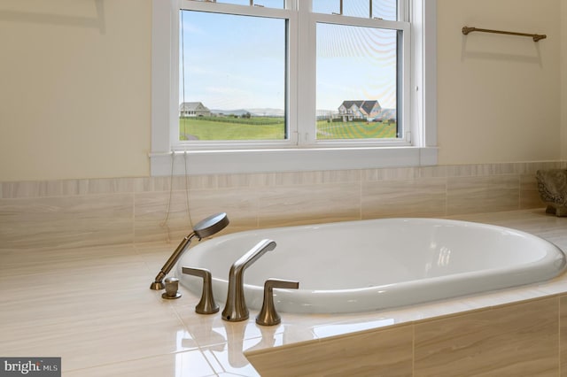 bathroom featuring a garden tub