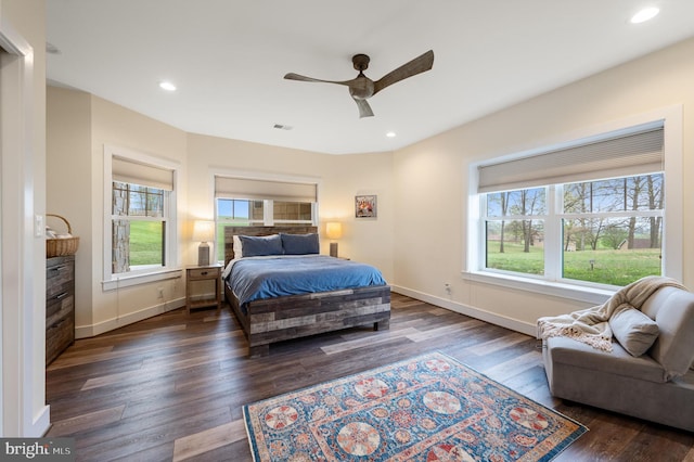 bedroom featuring recessed lighting, dark wood finished floors, visible vents, and baseboards