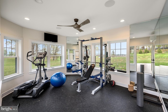 workout room featuring an AC wall unit, baseboards, recessed lighting, and ceiling fan