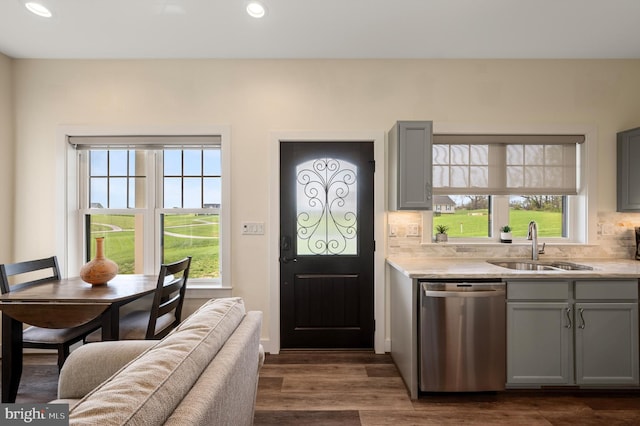 interior space featuring recessed lighting, dark wood finished floors, and a healthy amount of sunlight