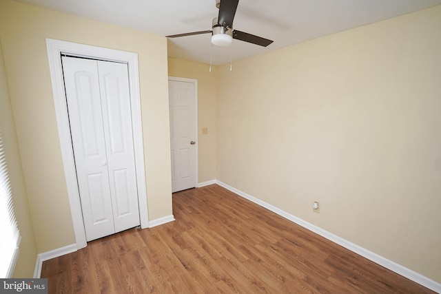 404 Sheldon Ave, Fruitland, MD 21826 - unfurnished bedroom featuring baseboards, ceiling fan, light wood finished floors, and a closet