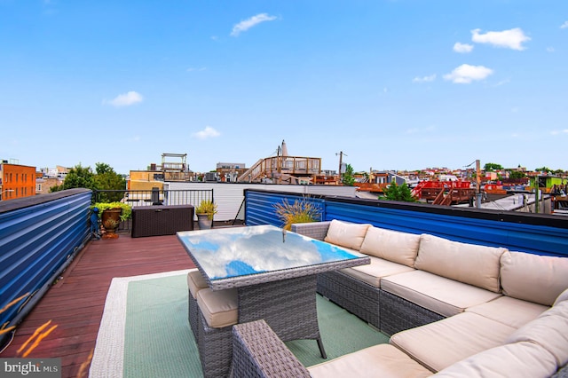 deck with outdoor lounge area and outdoor dining area