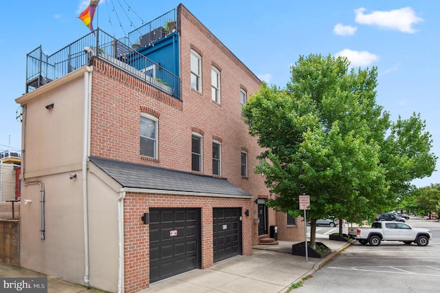 view of property featuring an attached garage