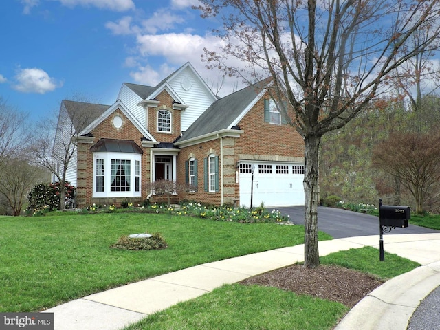1221 Whetstone Dr, Arnold, MD 21012 - view of front of property featuring a front yard, a shingled roof, a garage, aphalt driveway, and brick siding