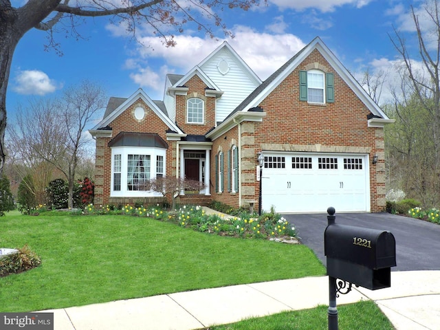 1221 Whetstone Dr, Arnold, MD 21012 - view of front of house featuring aphalt driveway, a front yard, a garage, and brick siding