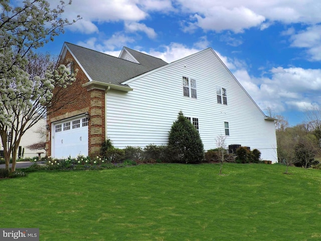 1221 Whetstone Dr, Arnold, MD 21012 - view of home's exterior featuring cooling unit, roof with shingles, a yard, and brick siding