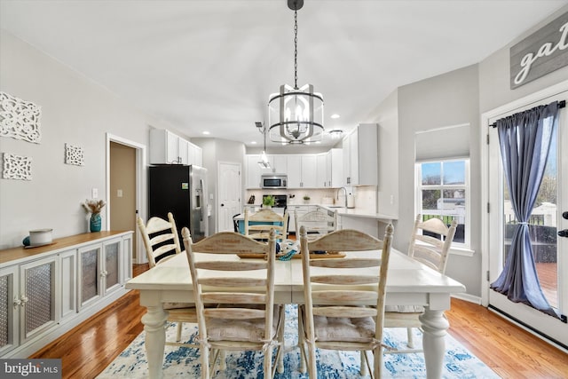 25 Mica St, Townsend, DE 19734 - dining room featuring a chandelier, recessed lighting, and light wood-style flooring