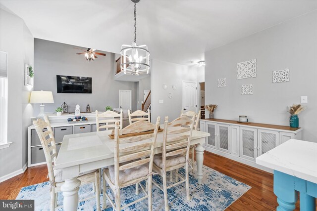 25 Mica St, Townsend, DE 19734 - dining room featuring baseboards, wood finished floors, and ceiling fan with notable chandelier