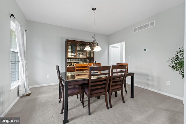 25 Mica St, Townsend, DE 19734 - dining room featuring light carpet, visible vents, baseboards, and a chandelier