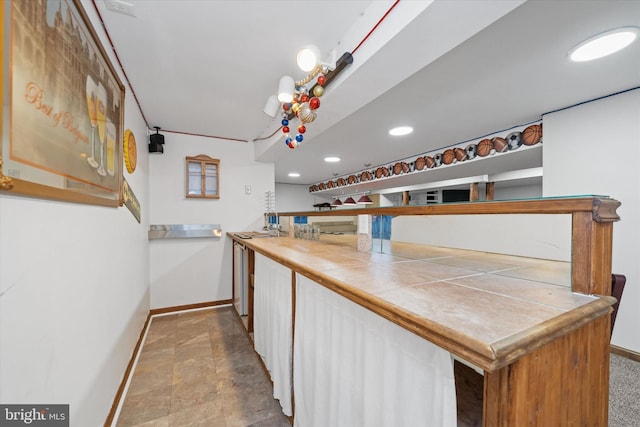 25 Mica St, Townsend, DE 19734 - kitchen featuring baseboards, stone finish flooring, and recessed lighting