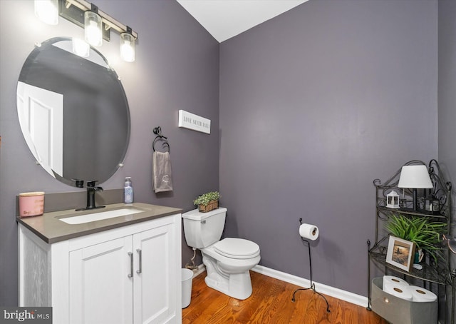 25 Mica St, Townsend, DE 19734 - bathroom with vanity, baseboards, toilet, and wood finished floors