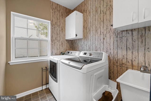 25 Mica St, Townsend, DE 19734 - washroom with a sink, cabinet space, baseboards, and washer and clothes dryer