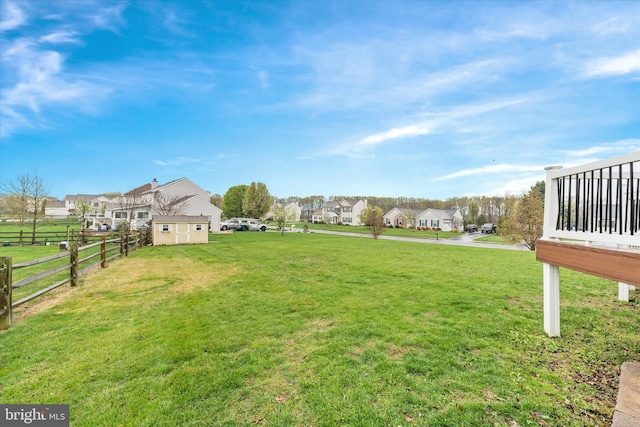 25 Mica St, Townsend, DE 19734 - view of yard with a residential view, fence, and an outbuilding