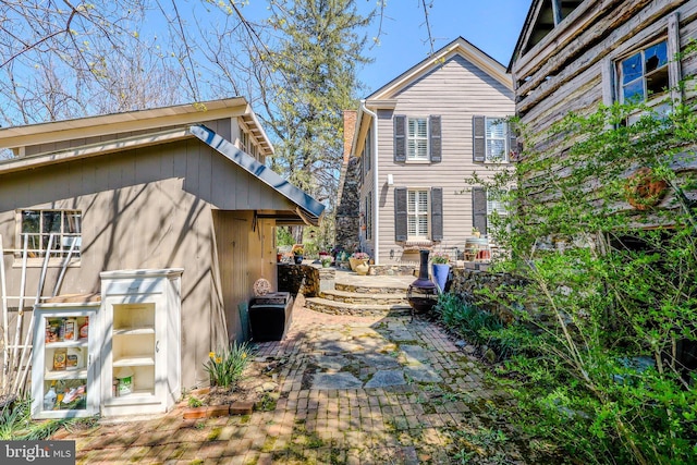 rear view of property with a patio area