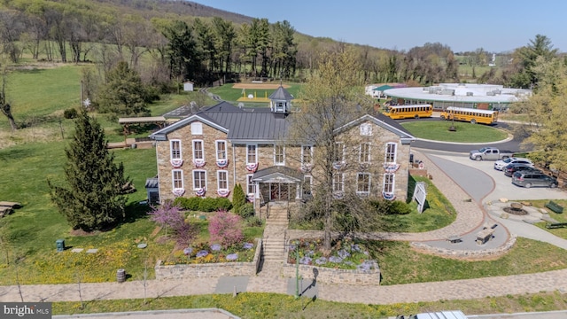 aerial view with a wooded view