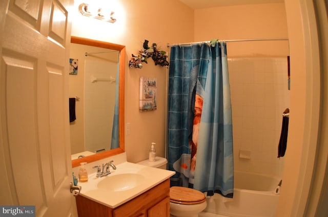 full bathroom with toilet, shower / bath combo, and vanity