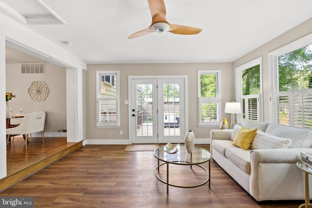 8620 Conover Pl, Alexandria, VA 22308 - living room featuring wood finished floors, baseboards, and a ceiling fan