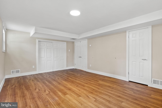 8620 Conover Pl, Alexandria, VA 22308 - unfurnished bedroom with light wood finished floors and baseboards