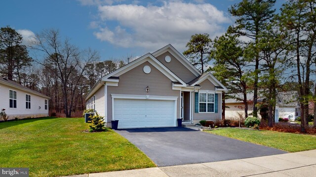 166 Blackburn St, Absecon, NJ 08205 - view of front facade featuring a garage, driveway, and a front yard