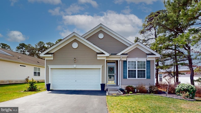 166 Blackburn St, Absecon, NJ 08205 - view of front facade with a garage, entry steps, driveway, and a front lawn