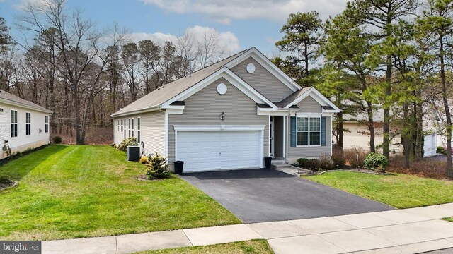 166 Blackburn St, Absecon, NJ 08205 - view of front of house with aphalt driveway, a front yard, cooling unit, and a garage