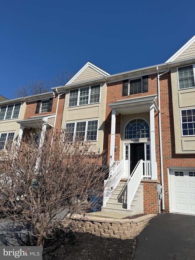 446 Hillside Dr, Mountville, PA 17554 - multi unit property with a garage, brick siding, and aphalt driveway