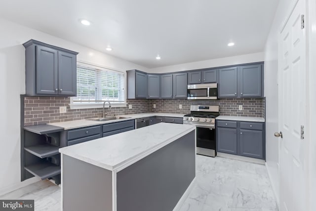446 Hillside Dr, Mountville, PA 17554 - kitchen with marble finish floor, a kitchen island, tasteful backsplash, appliances with stainless steel finishes, and a sink