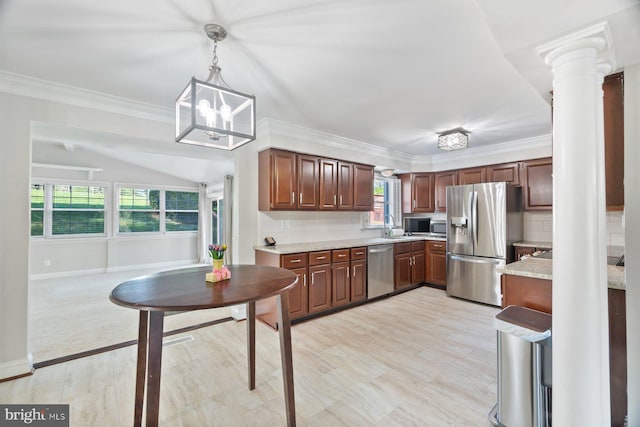 13108 Manor Dr, Mount Airy, MD 21771 - kitchen featuring stainless steel appliances, decorative light fixtures, a sink, decorative columns, and ornamental molding
