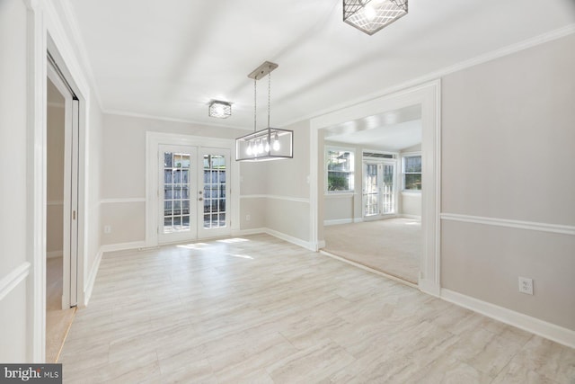 13108 Manor Dr, Mount Airy, MD 21771 - unfurnished dining area with french doors, ornamental molding, baseboards, and light wood-style flooring