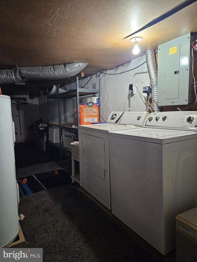 laundry area with water heater, washing machine and dryer, laundry area, and electric panel
