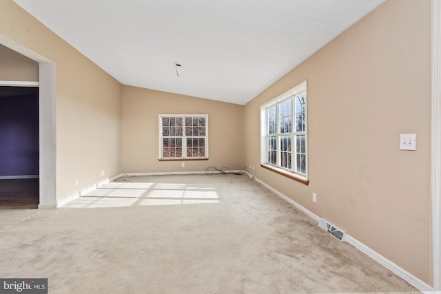 6335 Oxford Rd, Gardners, PA 17324 - unfurnished room featuring carpet, visible vents, baseboards, and lofted ceiling