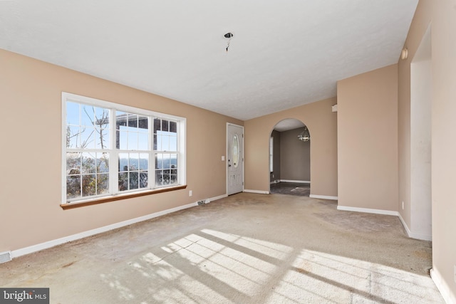 6335 Oxford Rd, Gardners, PA 17324 - spare room with carpet floors, baseboards, arched walkways, and visible vents