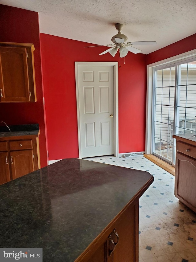 6335 Oxford Rd, Gardners, PA 17324 - dining room with a textured ceiling, a ceiling fan, and light floors