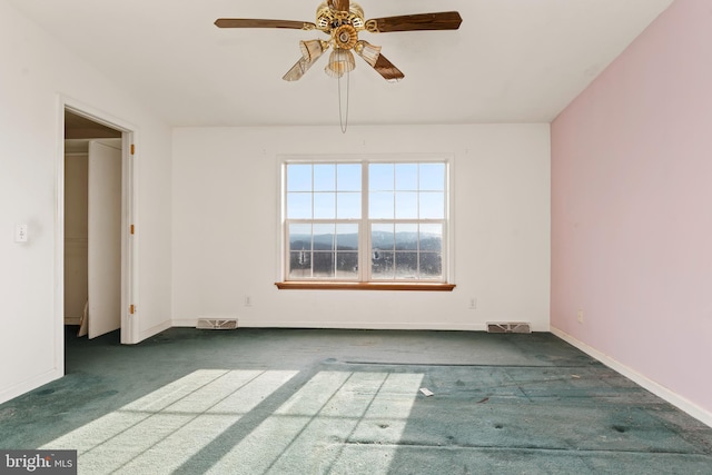 6335 Oxford Rd, Gardners, PA 17324 - spare room with visible vents, carpet flooring, ceiling fan, and baseboards