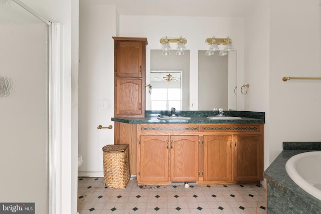 6335 Oxford Rd, Gardners, PA 17324 - bathroom with toilet, a bath, double vanity, and a sink