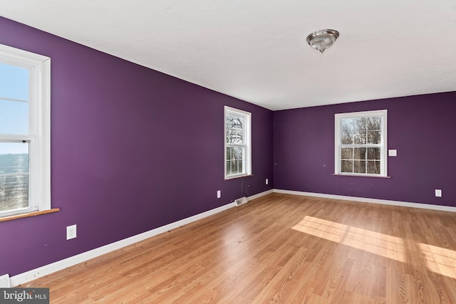 6335 Oxford Rd, Gardners, PA 17324 - spare room featuring baseboards, wood finished floors, and a healthy amount of sunlight