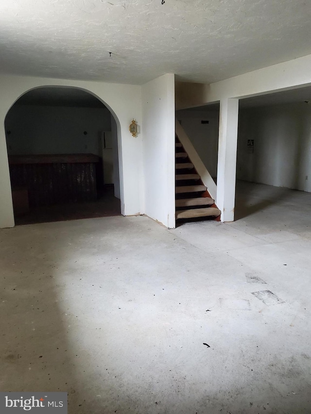 6335 Oxford Rd, Gardners, PA 17324 - below grade area with arched walkways, stairway, and a textured ceiling