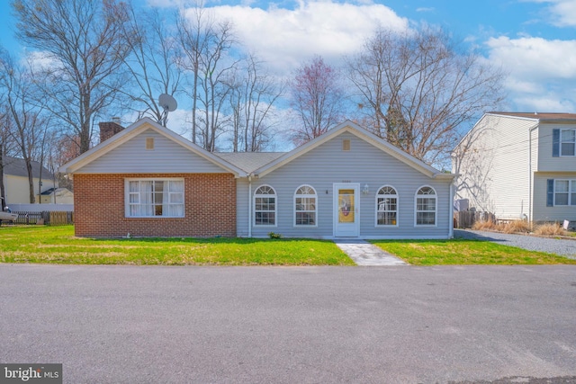 5984 2nd St, Deale, MD 20751 - ranch-style home featuring a chimney, brick siding, and a front yard